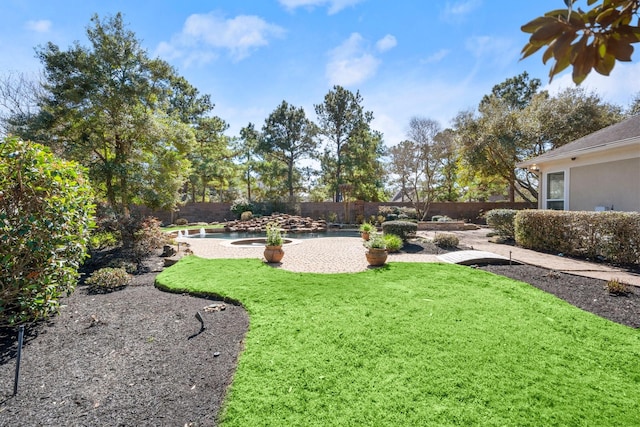 view of yard featuring a fenced backyard