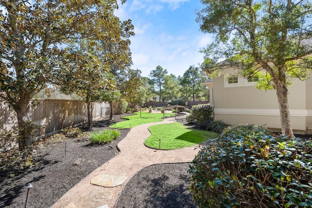 view of yard with fence