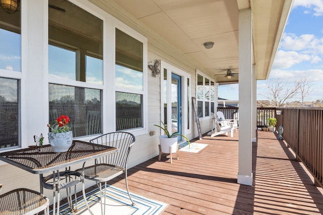 wooden deck with ceiling fan