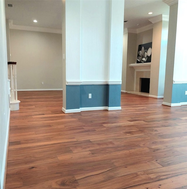 5523 Fragrant Cloud Ct, Houston, TX 77041 - empty room with crown molding, baseboards, wood finished floors, a fireplace, and recessed lighting