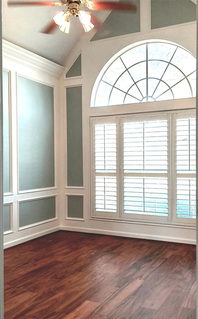 5523 Fragrant Cloud Ct, Houston, TX 77041 - spare room with crown molding, a ceiling fan, healthy amount of natural light, dark wood-style floors, and vaulted ceiling