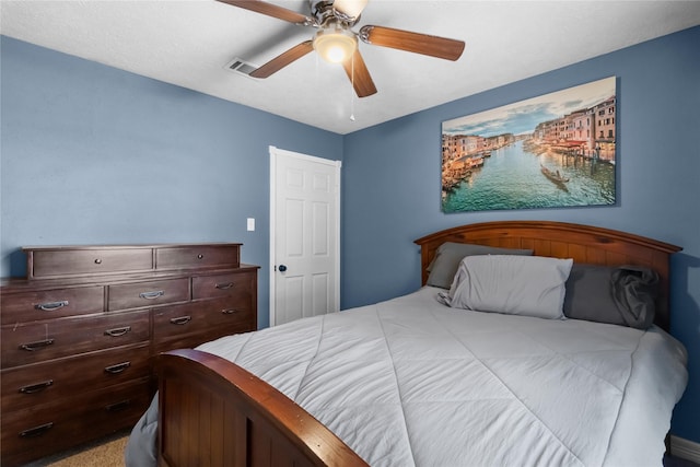 bedroom featuring visible vents and a ceiling fan