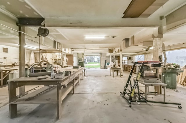 interior space featuring unfinished concrete flooring