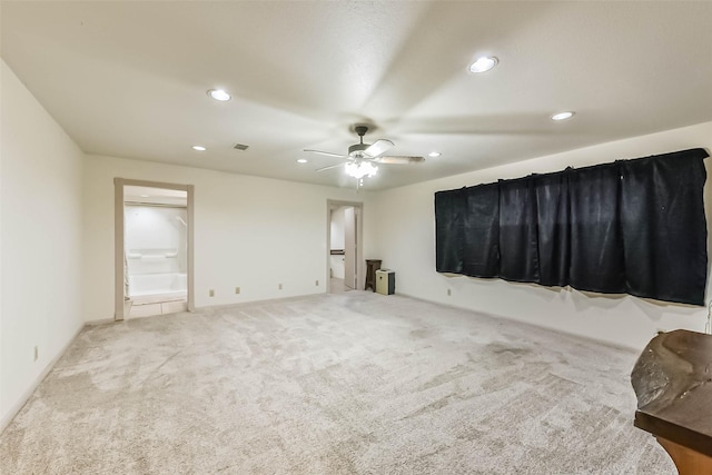 carpeted empty room featuring baseboards, a ceiling fan, visible vents, and recessed lighting