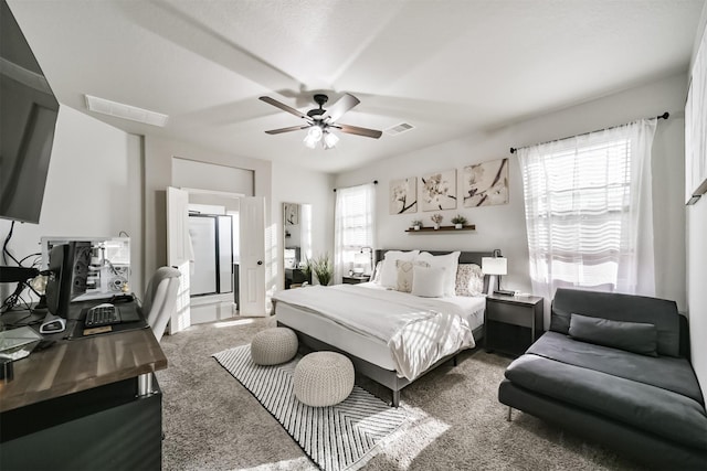 bedroom featuring carpet flooring, visible vents, and a ceiling fan