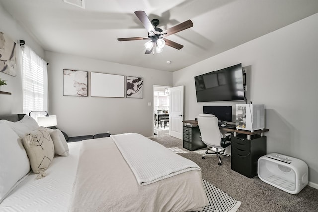 bedroom featuring ceiling fan, visible vents, and carpet flooring