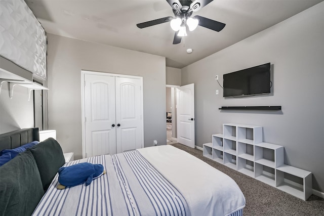 bedroom featuring a closet, carpet, a ceiling fan, and baseboards