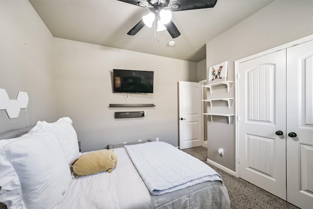 bedroom with a closet, carpet, a ceiling fan, and baseboards