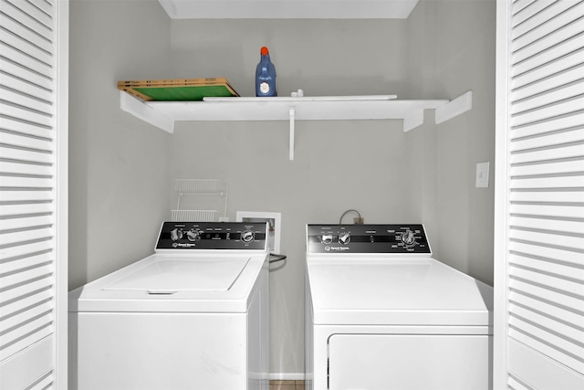 laundry area featuring laundry area and independent washer and dryer