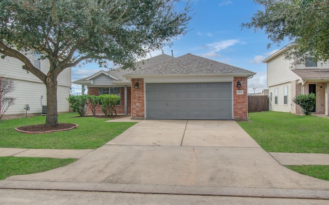 view of front of home featuring brick siding, roof with shingles, concrete driveway, an attached garage, and a front lawn