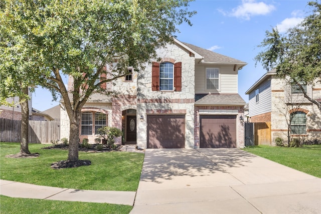 view of front of property with fence, a front lawn, concrete driveway, and brick siding