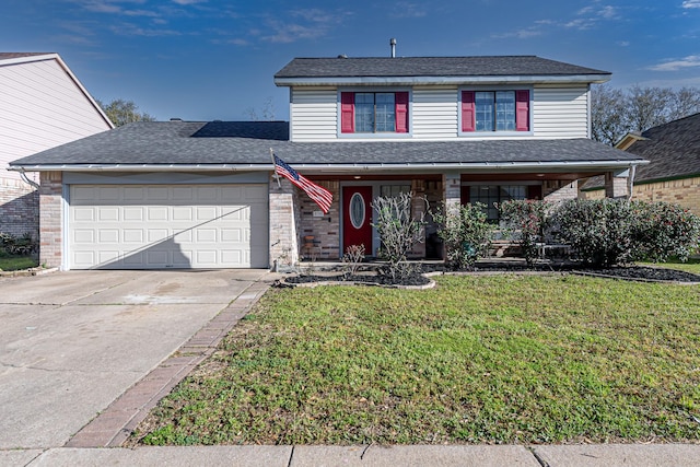 traditional-style home with an attached garage, concrete driveway, a front yard, and a shingled roof