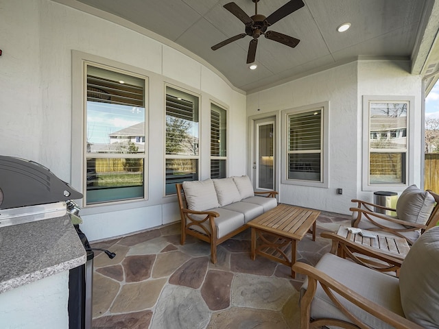 view of patio featuring an outdoor living space and ceiling fan