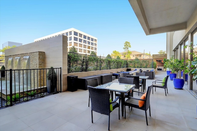 view of patio / terrace featuring outdoor dining area and an outdoor living space