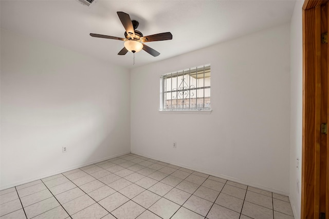 empty room featuring a ceiling fan