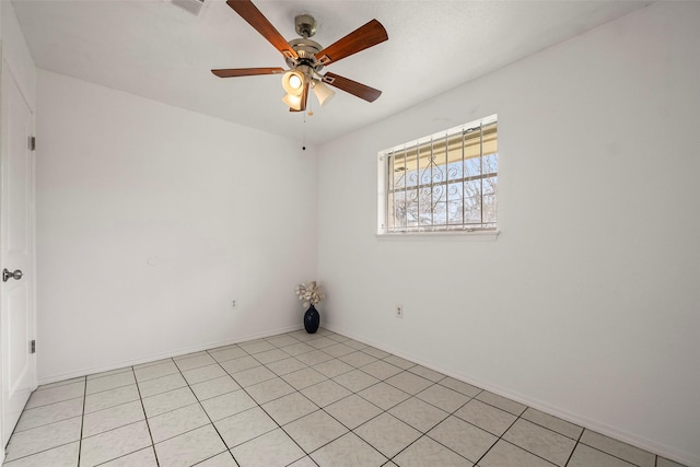 spare room featuring a ceiling fan