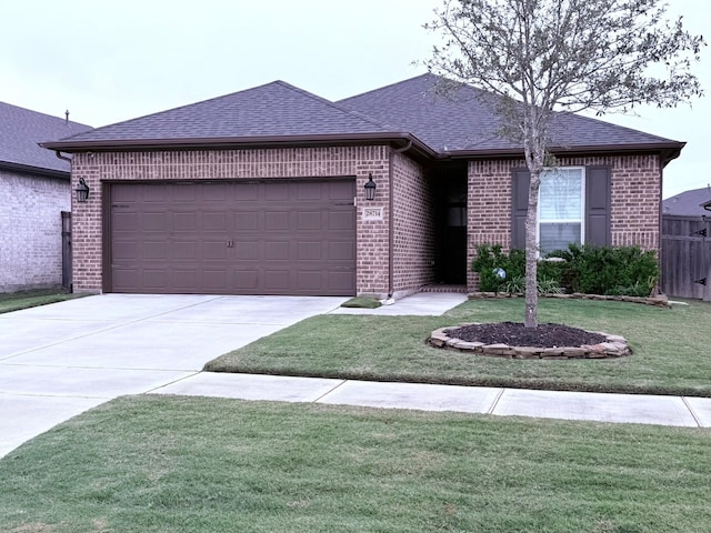 single story home featuring concrete driveway, brick siding, and a shingled roof