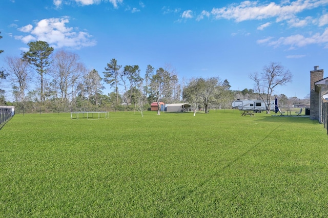 view of yard with fence