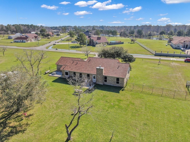 birds eye view of property featuring a rural view