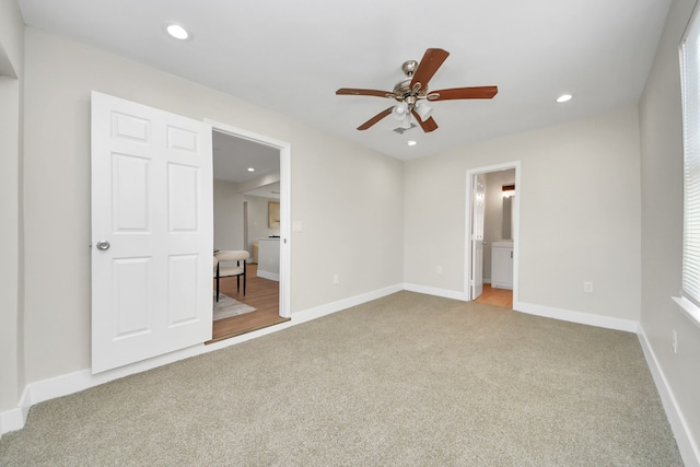 unfurnished bedroom with carpet floors, baseboards, and recessed lighting