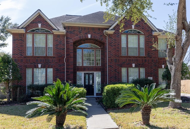 view of front of home with brick siding