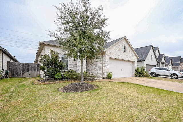 view of front facade featuring an attached garage, stone siding, concrete driveway, and a front yard