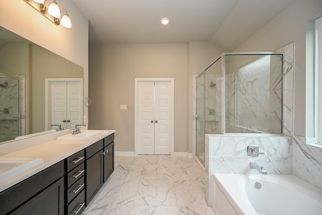 full bath featuring a marble finish shower, a sink, marble finish floor, a garden tub, and a closet