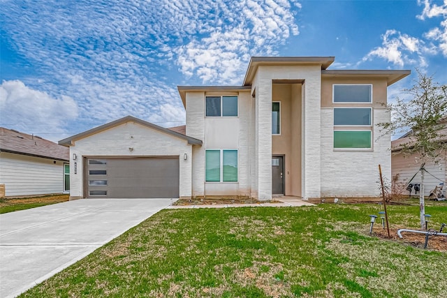 view of front of property with a garage, driveway, a front lawn, and stucco siding