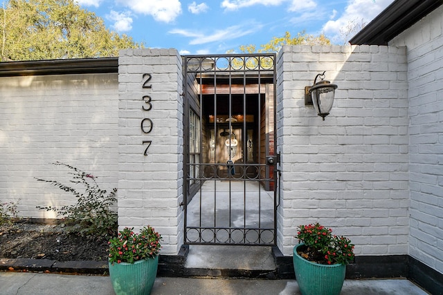 entrance to property featuring a gate