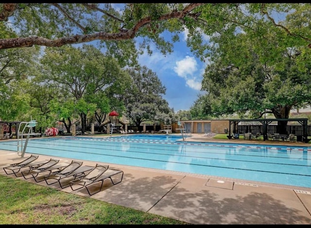 pool with a patio area