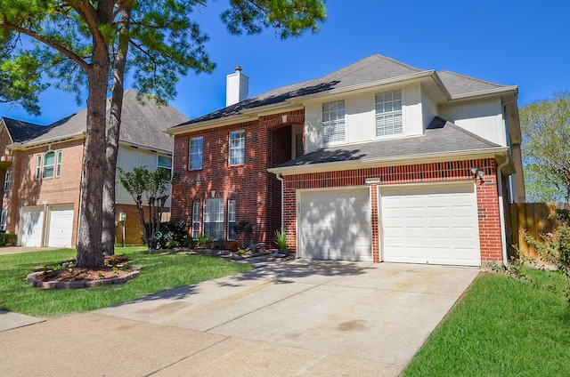 view of front facade with brick siding, concrete driveway, a chimney, an attached garage, and a front yard