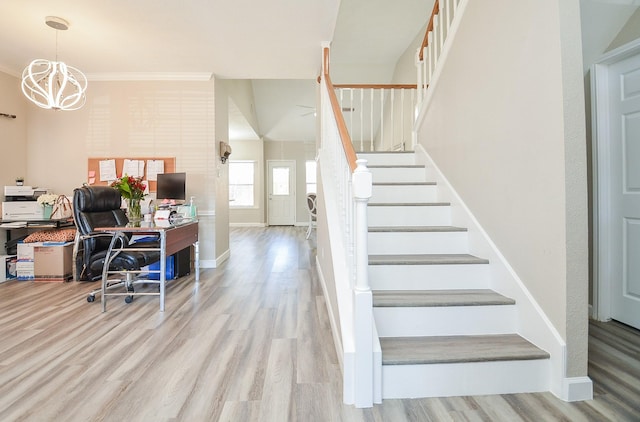 home office featuring ornamental molding, an inviting chandelier, wood finished floors, and baseboards