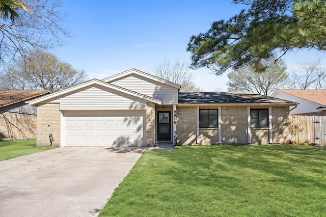 view of front of property with a garage, concrete driveway, brick siding, and a front lawn