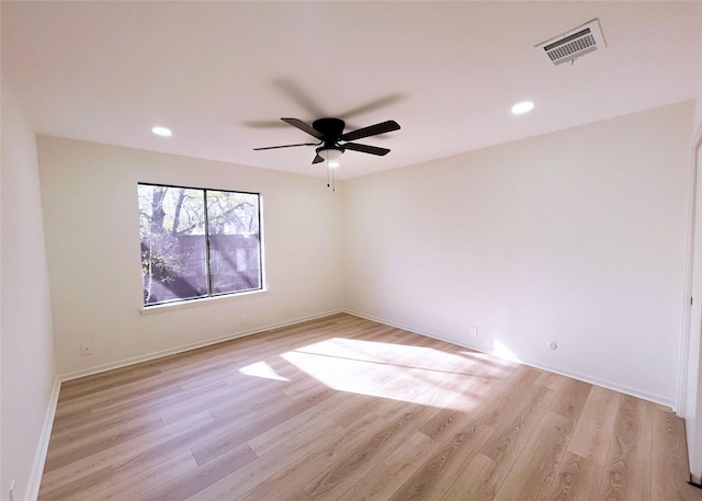 unfurnished room featuring visible vents, recessed lighting, and light wood-type flooring