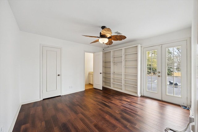 unfurnished bedroom with french doors, access to outside, wood finished floors, baseboards, and a ceiling fan