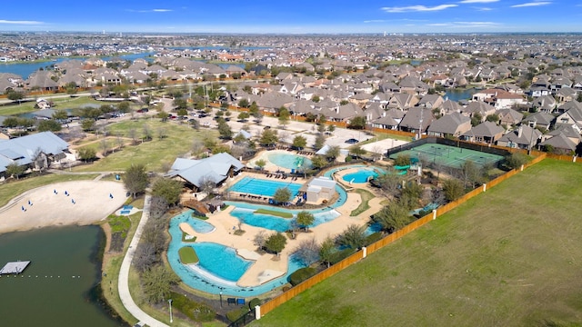 aerial view featuring a residential view and a water view