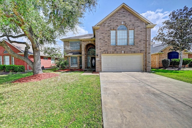 traditional-style house with a garage, a front yard, brick siding, and driveway