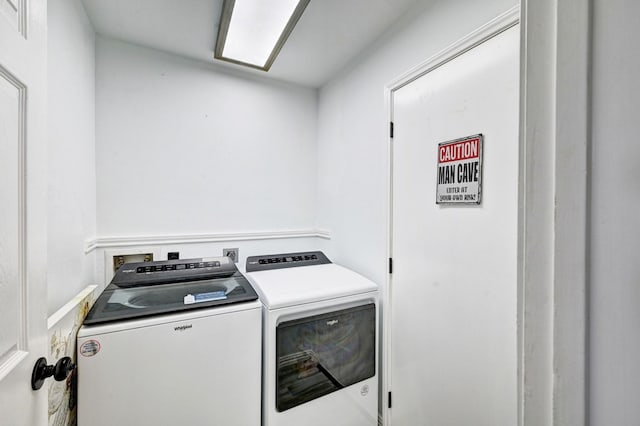 laundry room featuring laundry area and washer and dryer