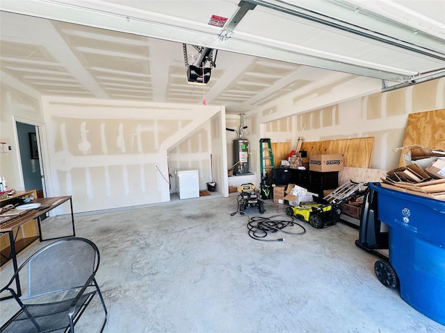 garage featuring water heater and a garage door opener