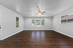 empty room with a ceiling fan, baseboards, wood finished floors, and recessed lighting