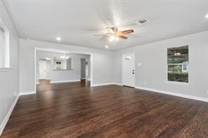 unfurnished living room featuring recessed lighting, ceiling fan, baseboards, and wood finished floors