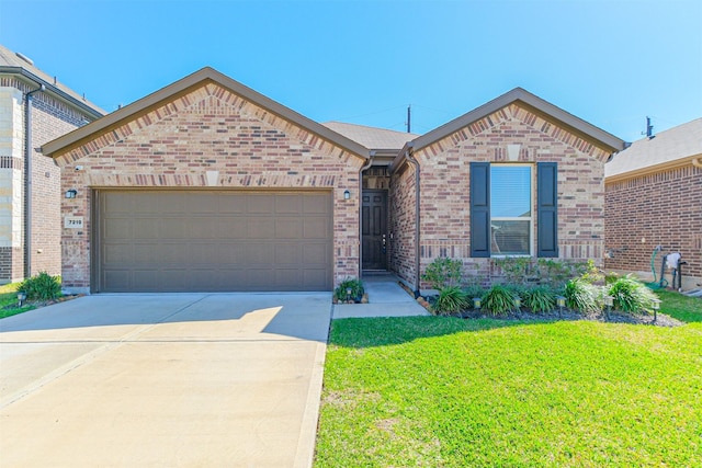 single story home with a front yard, driveway, a garage, and brick siding