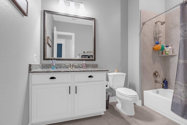 bathroom featuring tile patterned floors, vanity, toilet, and shower / tub combo with curtain