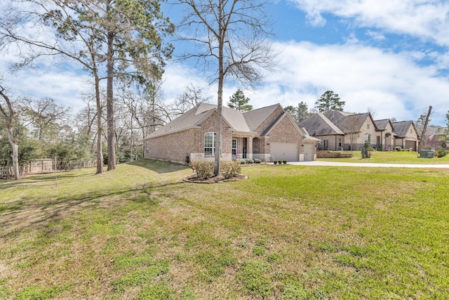 view of front facade featuring concrete driveway, brick siding, an attached garage, and a front lawn