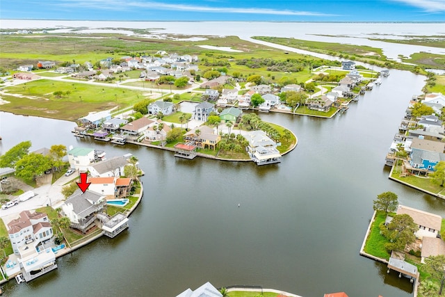 aerial view with a residential view and a water view