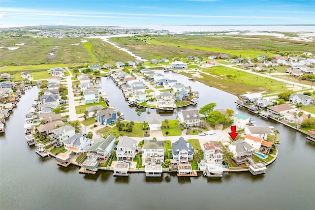 aerial view featuring a water view and a residential view