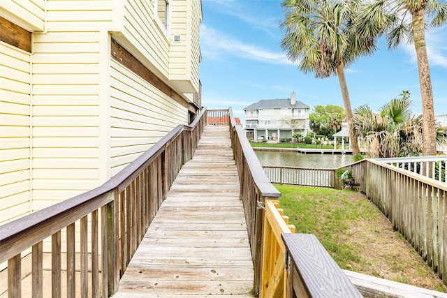 dock area with a water view