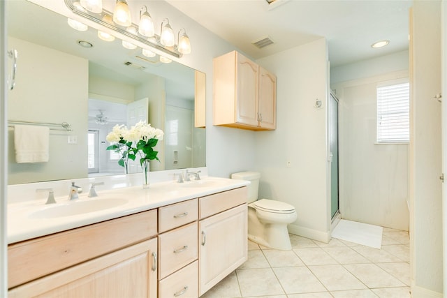 full bath with visible vents, a sink, and toilet