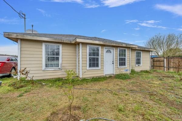 view of front of property featuring fence