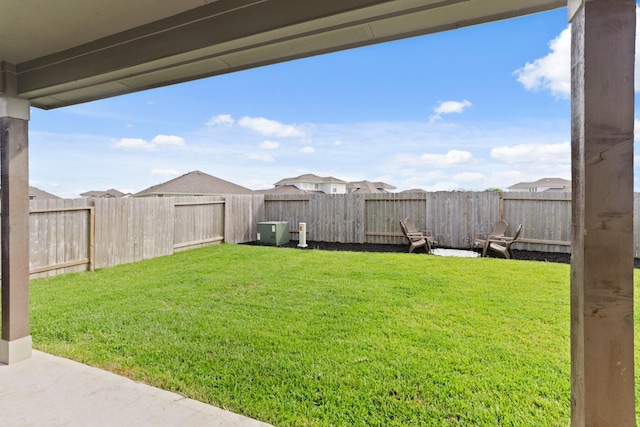 view of yard featuring a fenced backyard